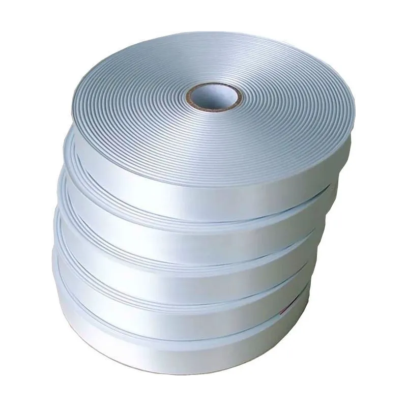 Satin ribbon roll for textile labels, compositions and washing symbols
